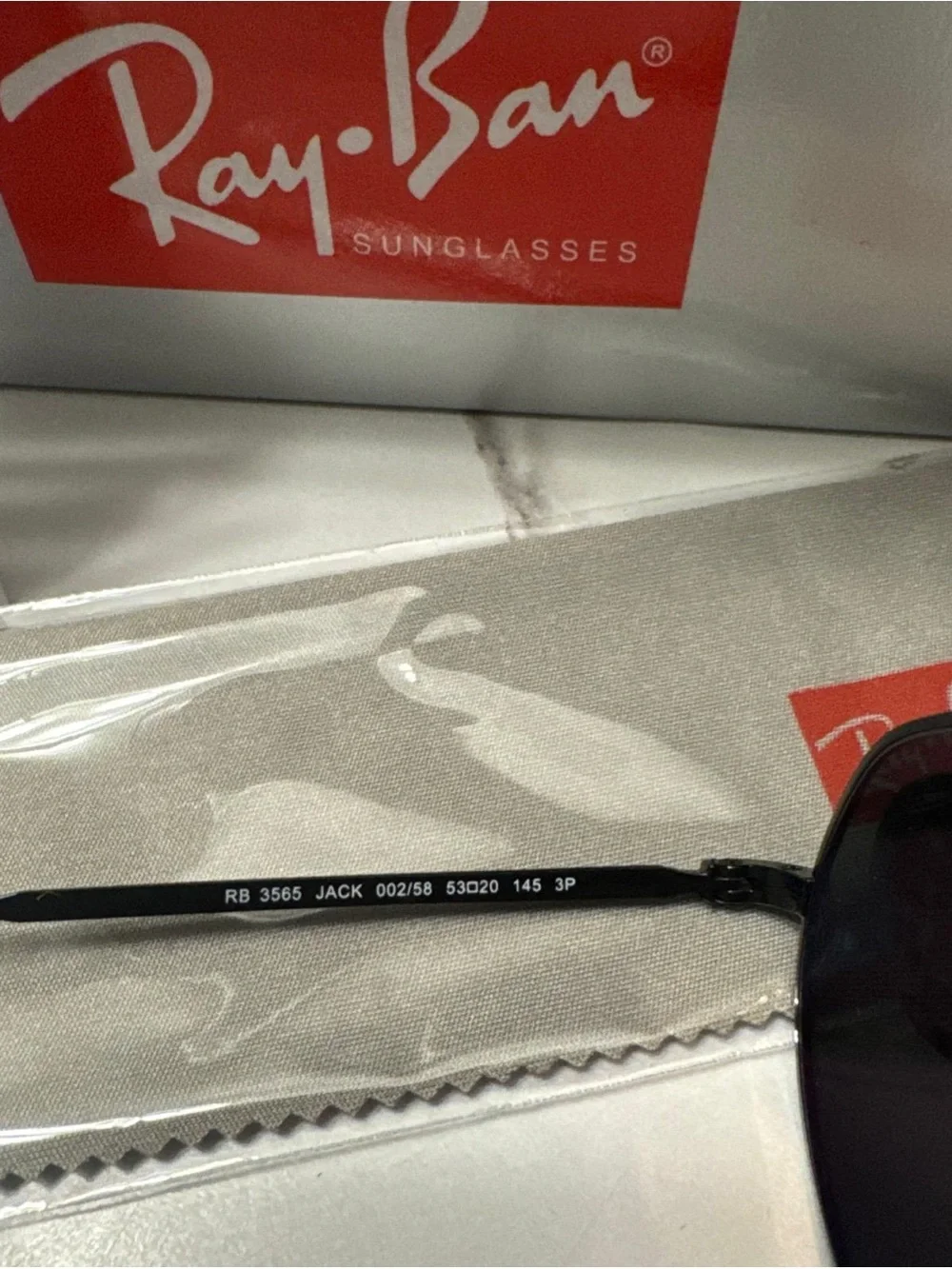 Ray-Ban Black Frame Sunglasses with Green Polarized Lenses
